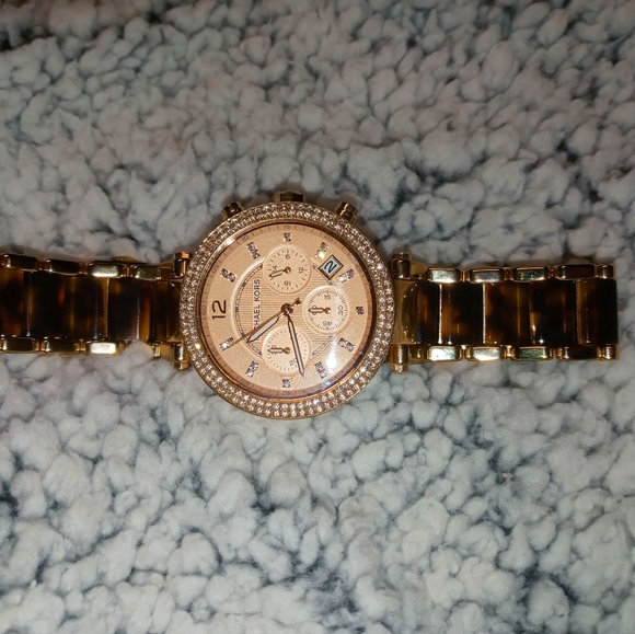 Rose gold & tortoise mk watch